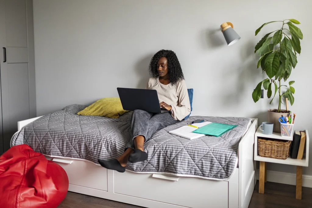 Student in her room studying